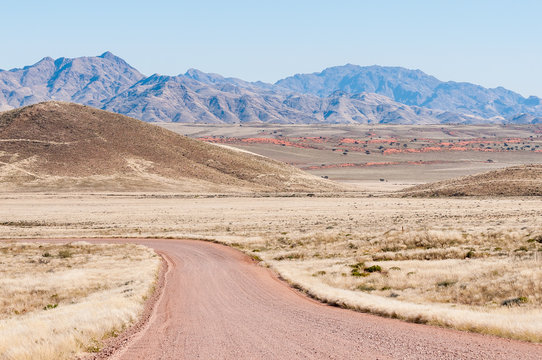 Road and mountain landscape on road C27 in Namibrand