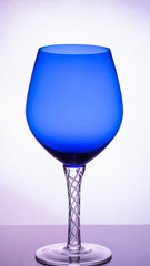 blue glass for a drink on a light background