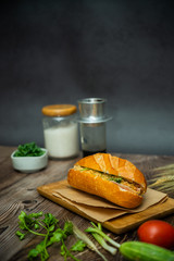 Snack at break time. Famous Vietnamese food is Banh mi thit and black coffee, popular street food...
