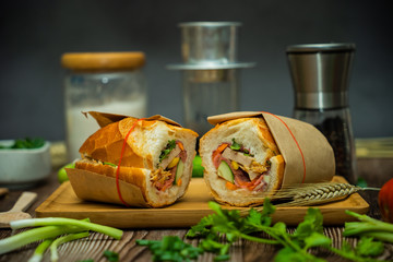 Snack at break time. Famous Vietnamese food is Banh mi thit and black coffee, popular street food...