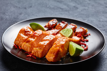 sticky teriyaki salmon fillets on a plate