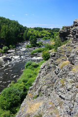 Fototapeta na wymiar Stone boulders in a mountain river
