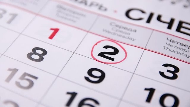 Make a red cirkle with marker on the date, numbers 2 in the calendar