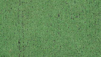 green wicker floor with a flourishing black background as an abstract design place