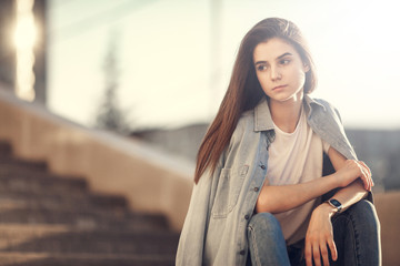 Beautiful tourist girl on city street. Gorgeous young model