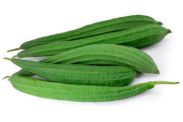 Farm fresh ridge gourds (angled luffa fruit) with isolated on white background