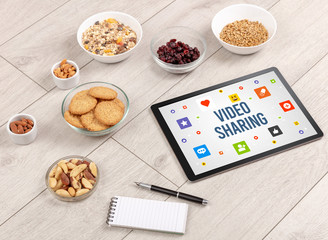 Healthy Tablet Pc compostion with VIDEO SHARING inscription, Social networking concept