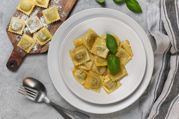 Roasted ravioli with basil.  top view, recipe  Italian cuisine.