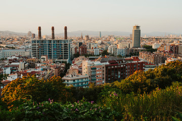 Sunset in a factory within a city.