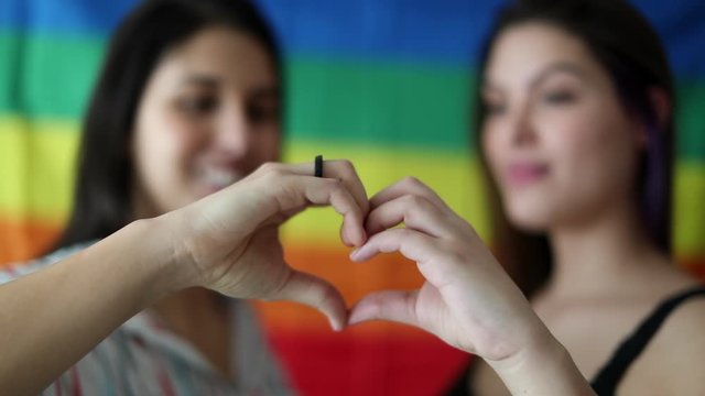 Gay LGBT lesbian couple kissing
