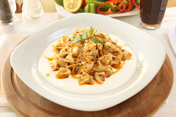Traditional turkish ravioli, Kayseri Mantı with sauce
