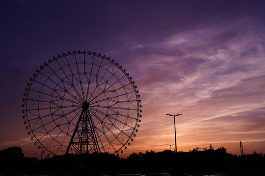 Ferris wheel after sunset at Kasai Rinkai koen, Tokyo, Japan. Purple and blue sky is beautiful.
