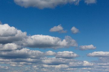 Beautiful clouds on a background of blue sky