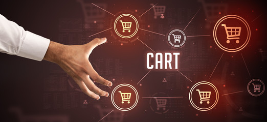 Close-Up of cropped hand pointing at CART inscription, online shopping concept