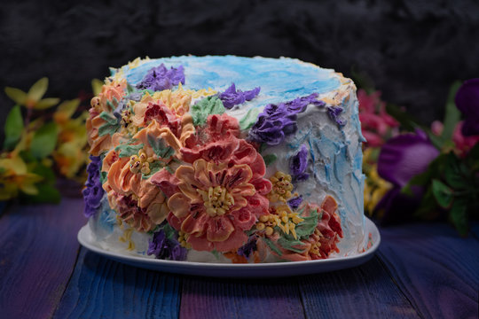 Summer Buttercream Flowers Cake On Coloraful Background