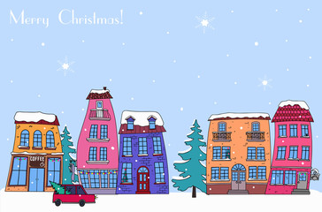 Winter city landscape on Christmas eve. Snow day, street with bright decorative houses. For postcards, prints, and other design elements.