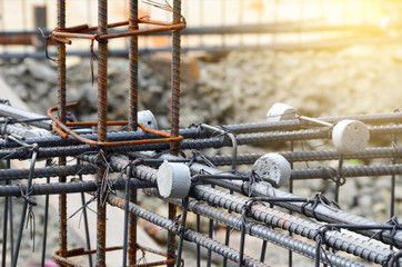 The construction steel bars are strapped with several strands of wire, and the circular cement is bonded at a distance, to provide the strength of the building foundation.