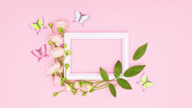 Romantic roses with leaves and butterflies surround white frame for text.Stop motion 