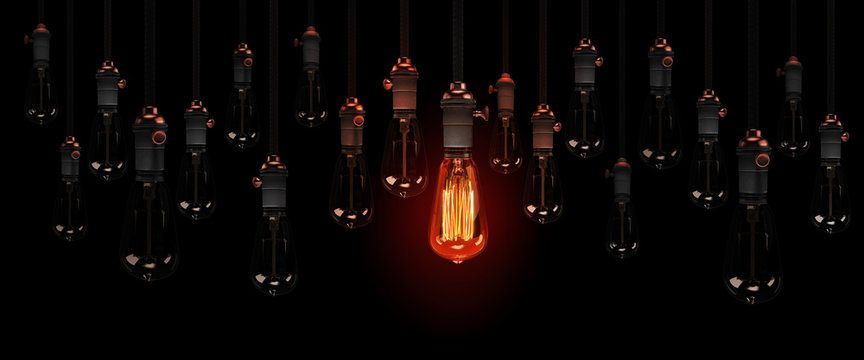 geniale idee, individualit&auml;t oder herausragendes merkmal, visualisiert mit brennenden edison gl&uuml;hbirnen
