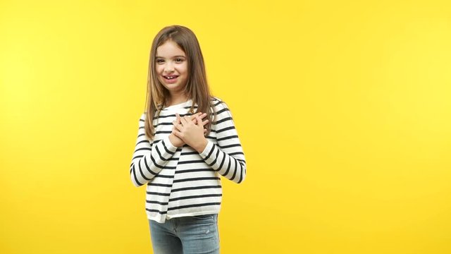 Funny little child girl doing a romantic gesture