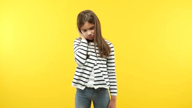 Funny little child girl worried and overwhelmed