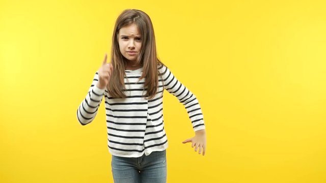 Funny little child girl scolding someone very angry