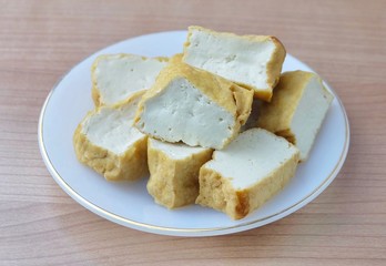Golden Brown Deep Fried Tofu on White Dish