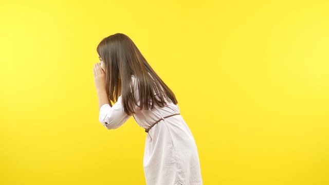 Funny little child girl whispering gossip undertone