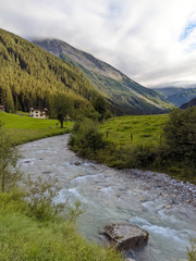 Fototapeta na wymiar View to Tuxertal valley with Tux river and Zillertal alps near village Juns and Hintertux glacier in summer, Tirol Austria Europe