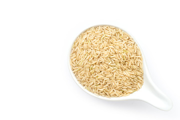 Brown rice ( coarse ,unpolished or half milled rice) in bowl isolated on white background.