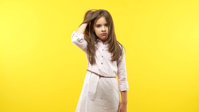 Funny little child girl tired and very sleepy