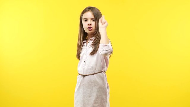 Funny little child girl showing number one