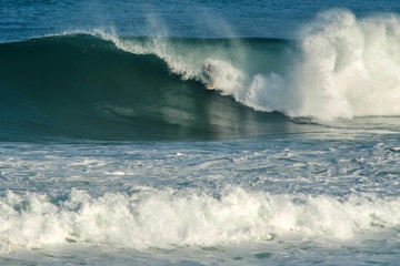 surfer in big waves