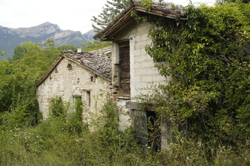 Fototapeta na wymiar ancient mountain wrecked abandoned house