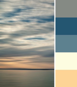 Beautiful azure blue sky with orange grey clouds above dark blue sea horizon at sunset evening time. Color palette swatches, natural combination of colors inspired by nature, colors of marine sundown.