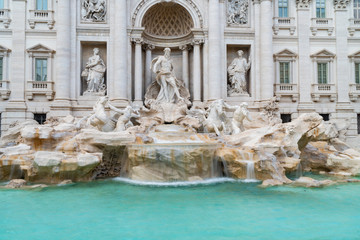 Fototapeta na wymiar The Trevi Fountain (Italian: Fontana di Trevi) is a fountain in the Trevi rione in Rome, Italy. The Trevi Fountain was finished in 1762 by Giuseppe Pannini.