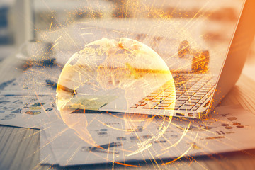 Computer on desktop with social network theme icon. Multi exposure. Concept of international connections.