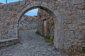 Fototapeta na wymiar Stone Arch, Stone Walls, Stone Path, Braga, Portugal