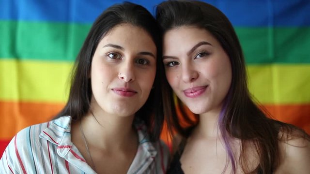 Lesbian couple portrait smiling. Two LGBT pride girlfriends