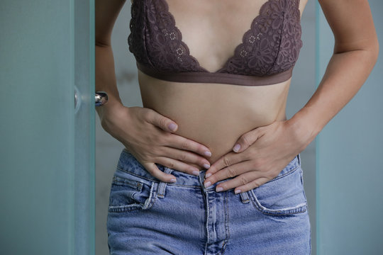 Woman having painful stomachache, chronic gastritis or abdomen bloating	