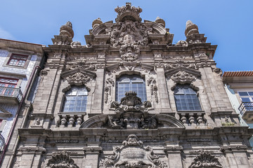 Fototapeta na wymiar Renaissance and Gothic style Facade of Church of Mercy of Porto (Santa Casa da Misericordia of Porto, XVI century) at Rua das Flores in Porto city. Portugal.