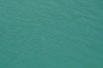 water ripples shine and gliter in the sun