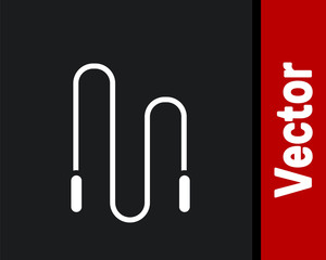 White Jump rope icon isolated on black background. Skipping rope. Sport equipment. Vector Illustration.