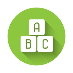 White ABC blocks icon isolated with long shadow. Alphabet cubes with letters A,B,C. Green circle button. Vector Illustration.