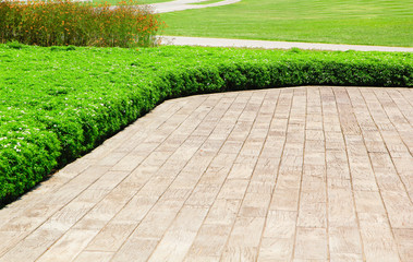 green grass and wooden floor