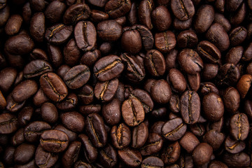 A roasted coffee beans texture background.