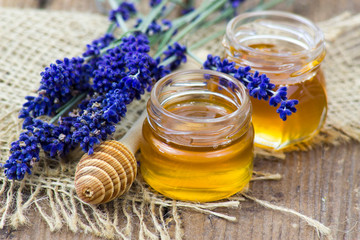 honey and lavender on wooden background
