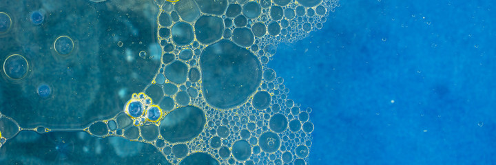 Water bubbles abstract blue panoramic background