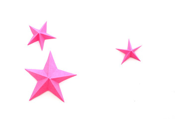 three pink paper christmas stars