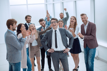 Fototapeta premium boss and the gleeful business team standing together